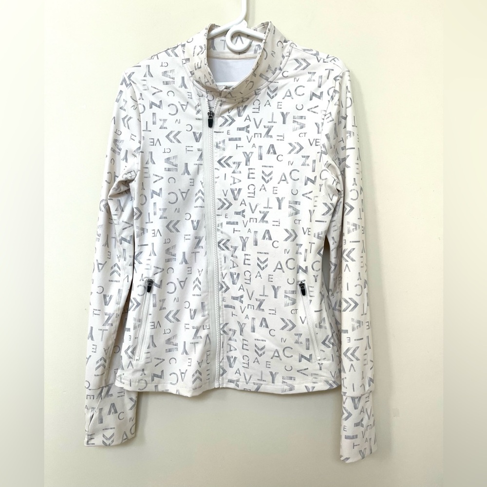 ZYIA Active ~ Zip up Jacket ~ Ivory with gray graphic lettering ~ Size: Large